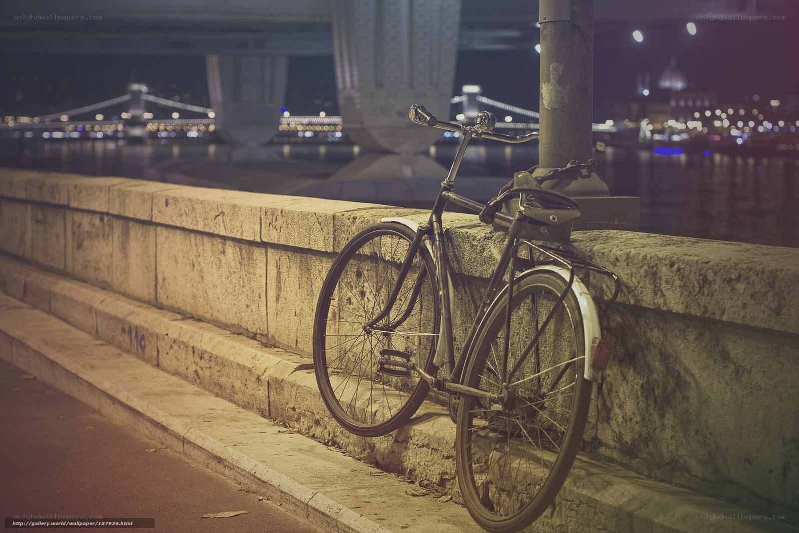 Bicycle by the river at night