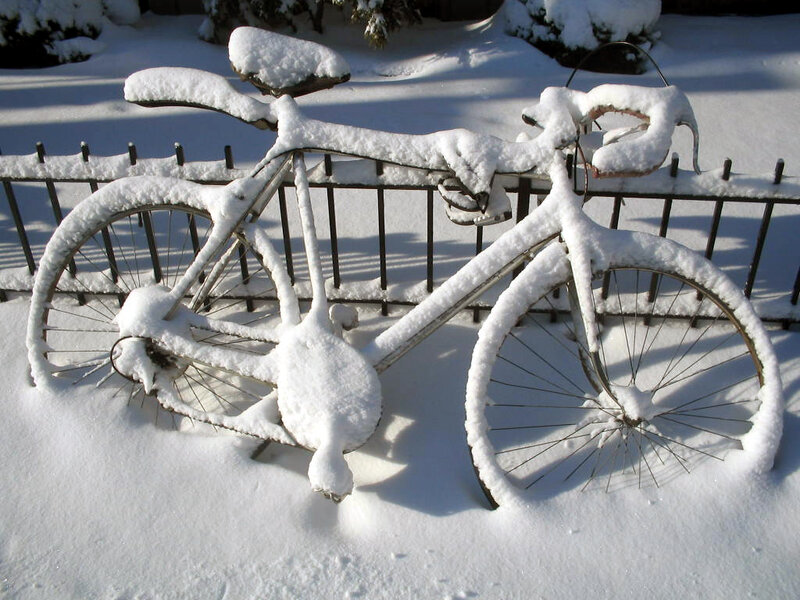 Bicycle Covered in Snow — White