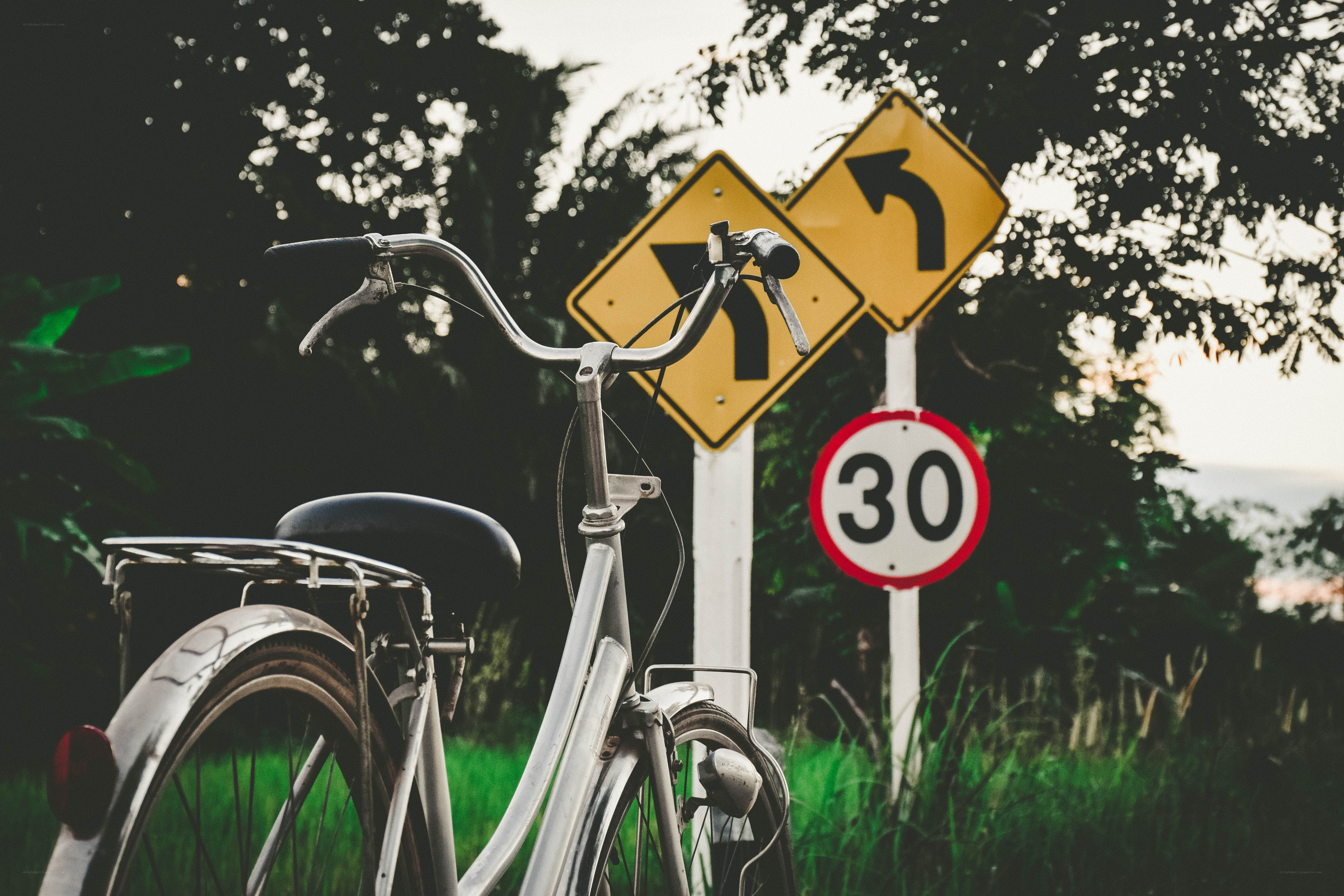 Bicycle near road signs