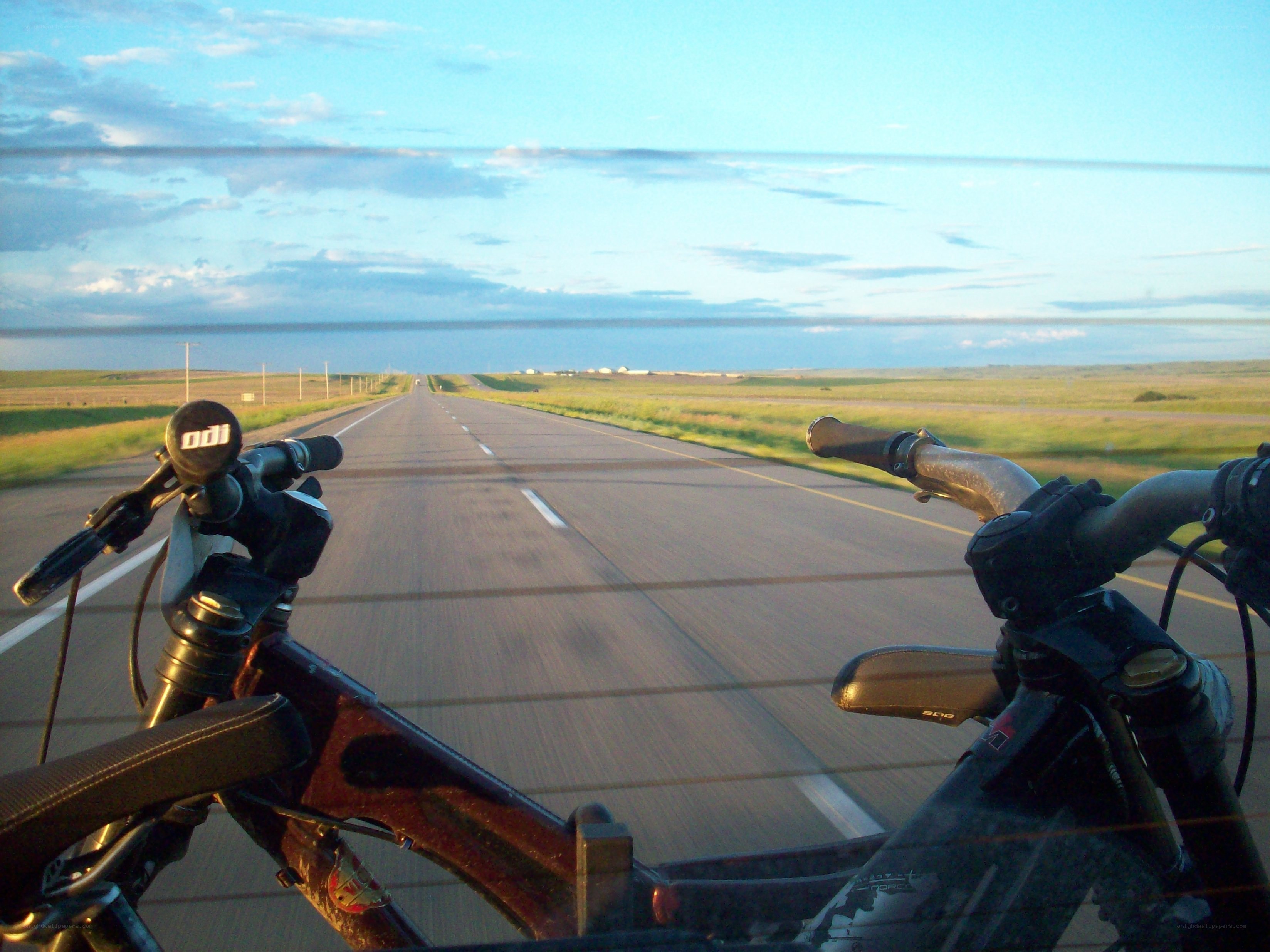 bicycle on a long road