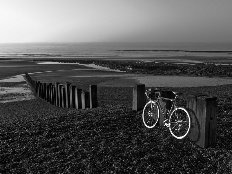 Bicycle on a pebble beach