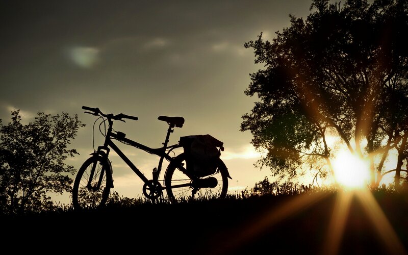 Bicycle on Hill at Sunset