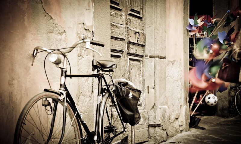 Bicycle parked in narrow alley
