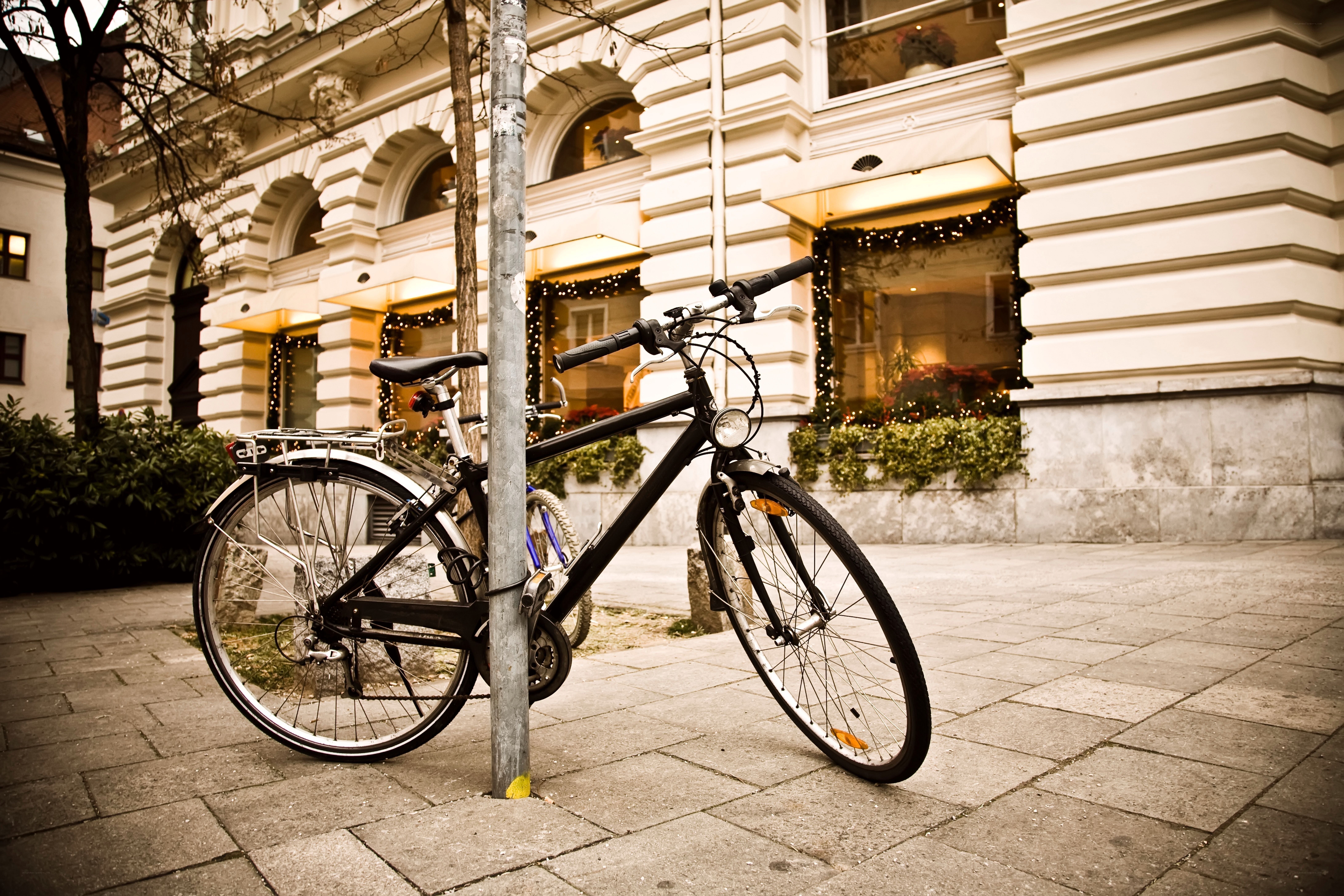 Bicycle parked on city sidewalk