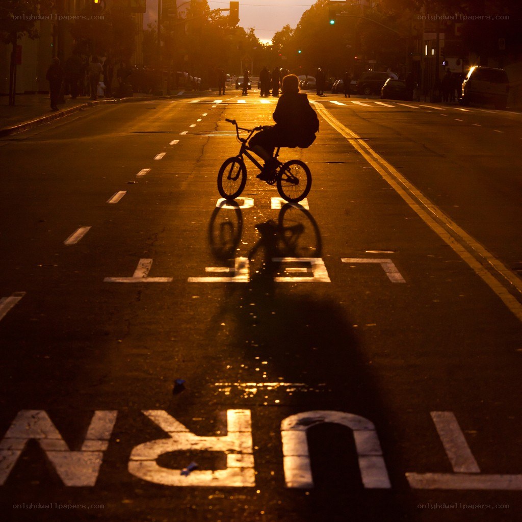 Bicycle rider at sunset
