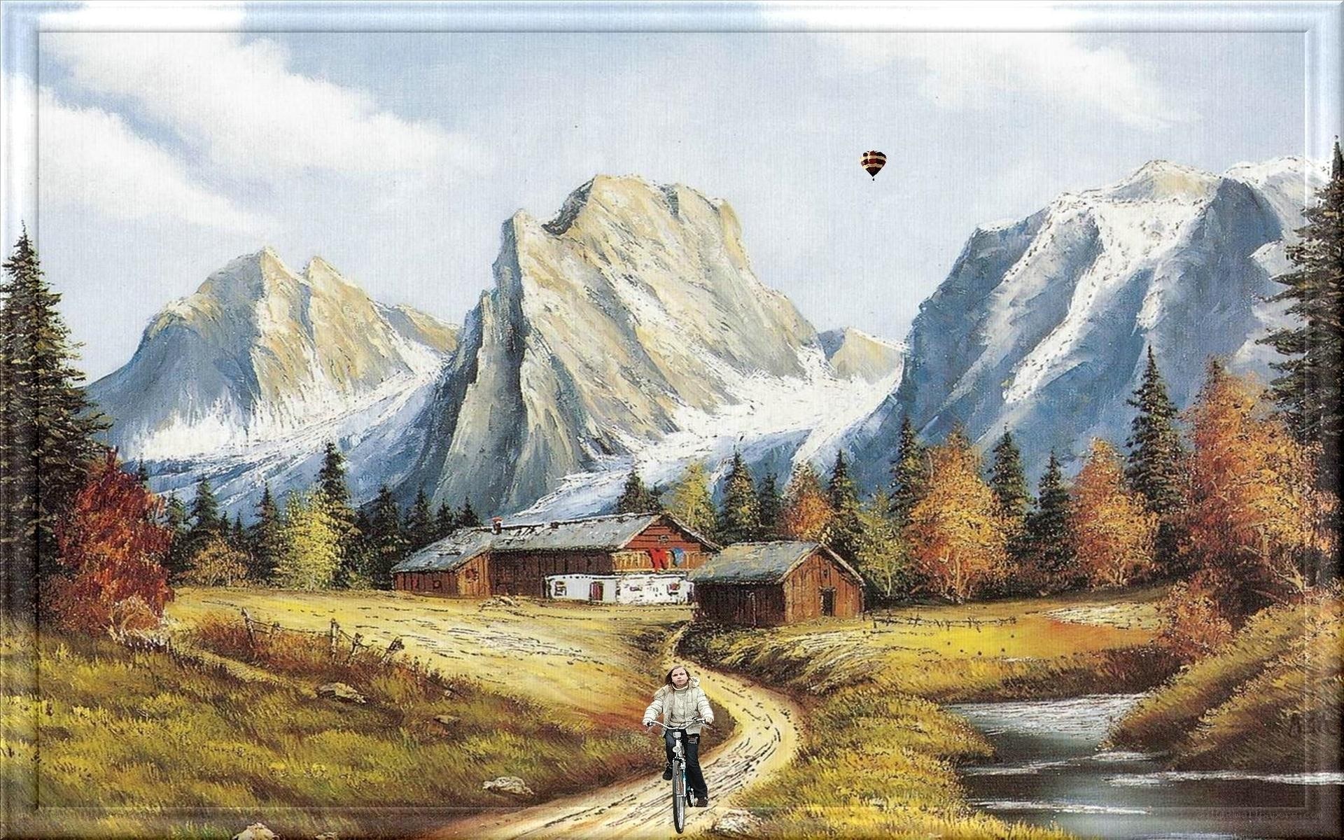 Bicycle rider in mountain valley