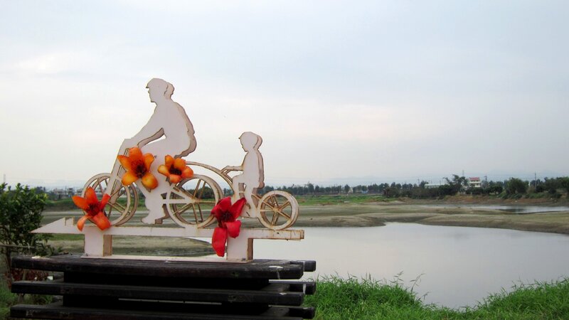 Bicycle Sculpture with Flowers