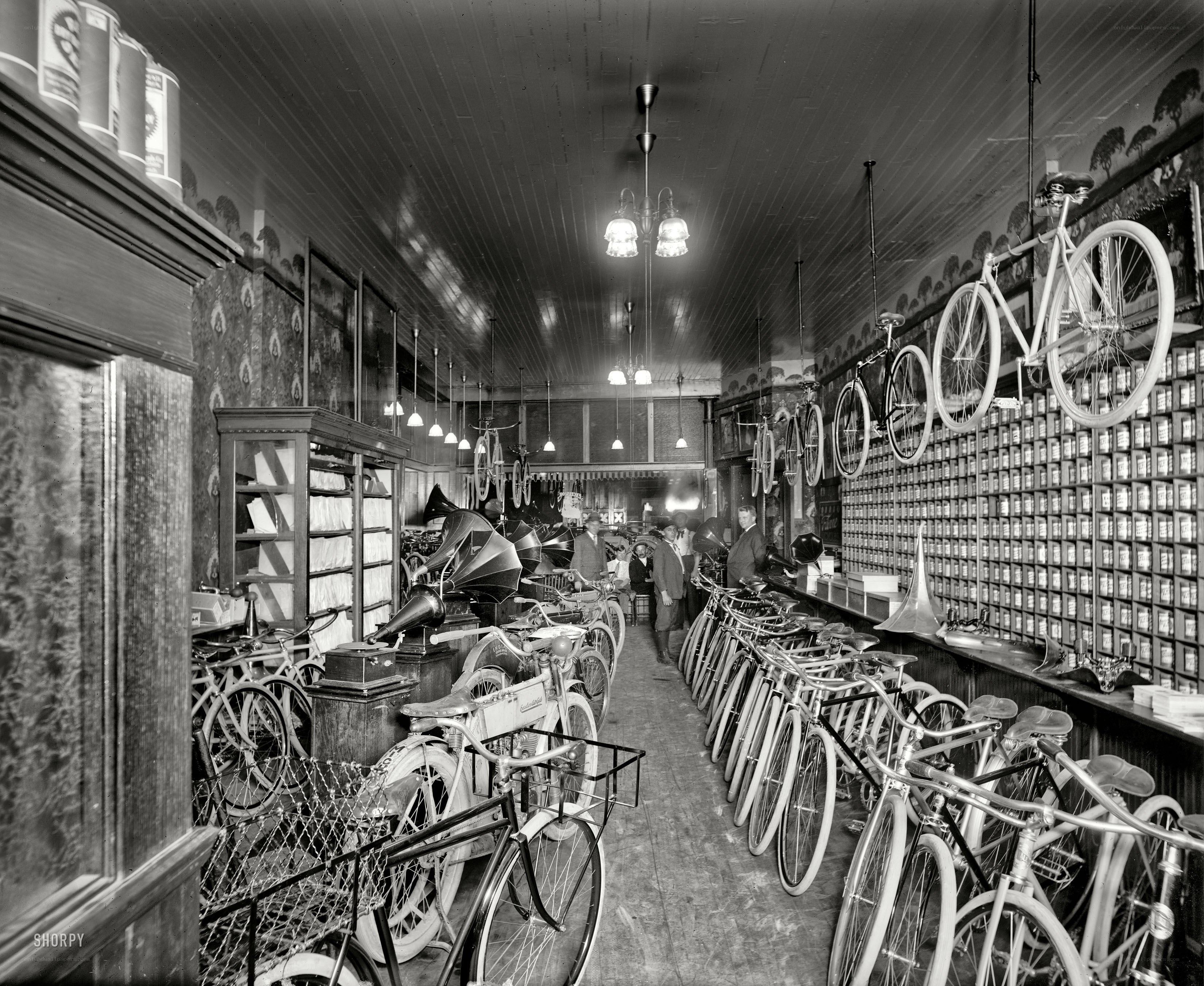 Bicycle shop interior with phonographs