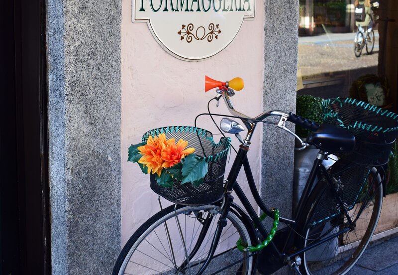 Bicycle with flowers outside shop