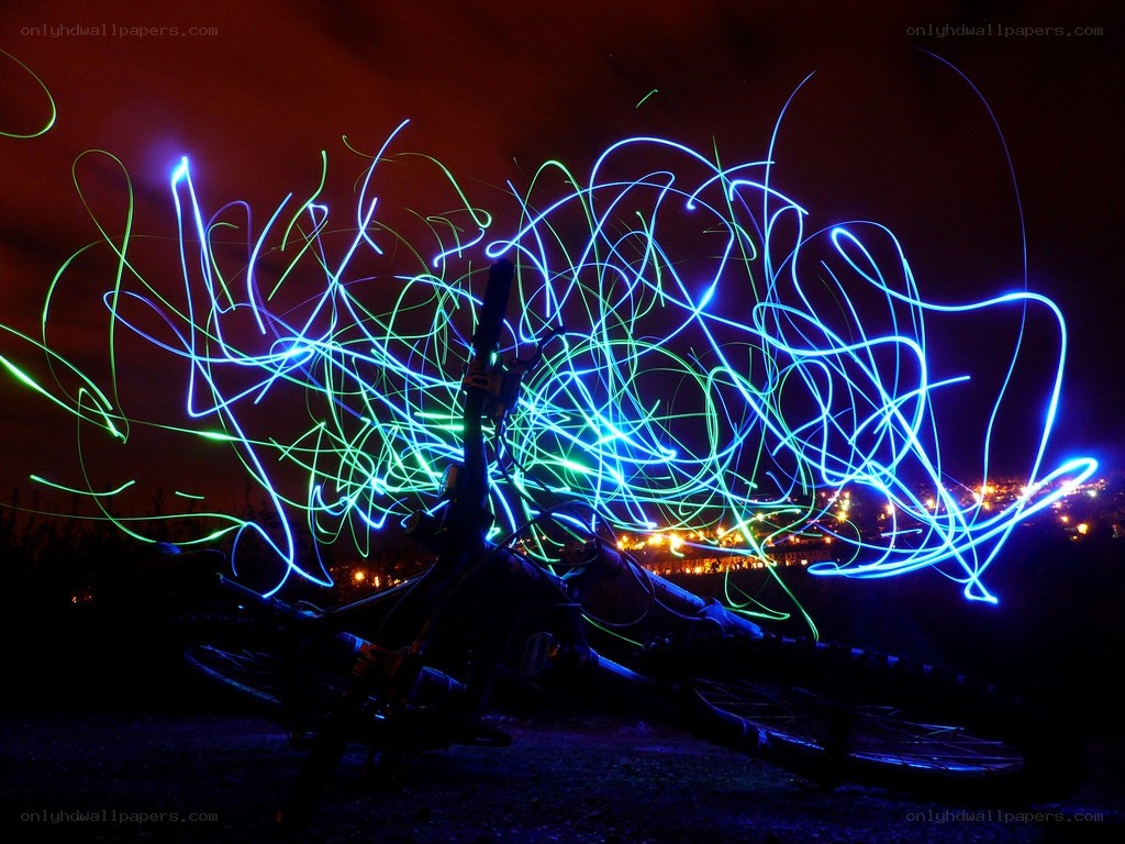 Bicycle with light trails at night