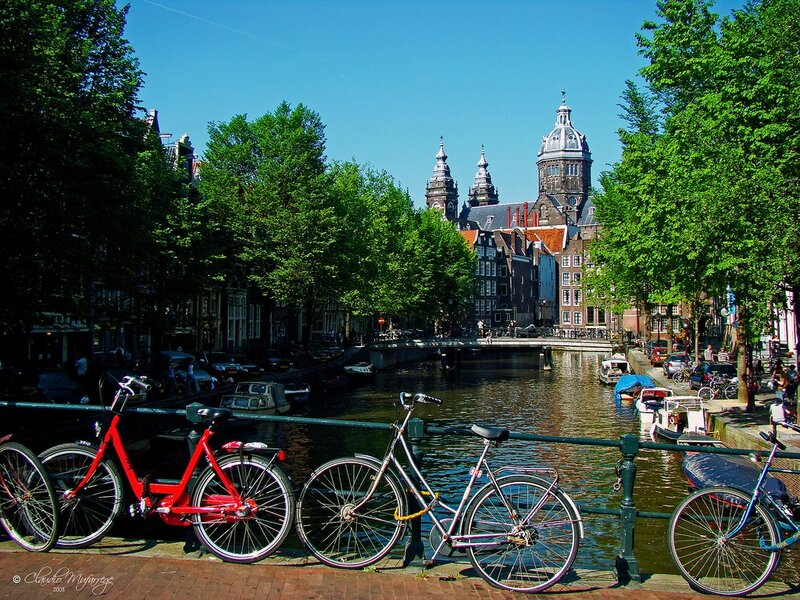 Bicycles by a canal in Amsterdam