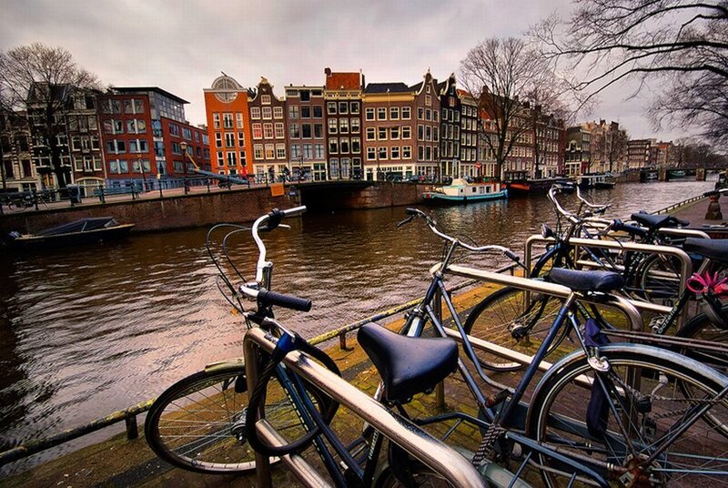 Bicycles by Amsterdam canal