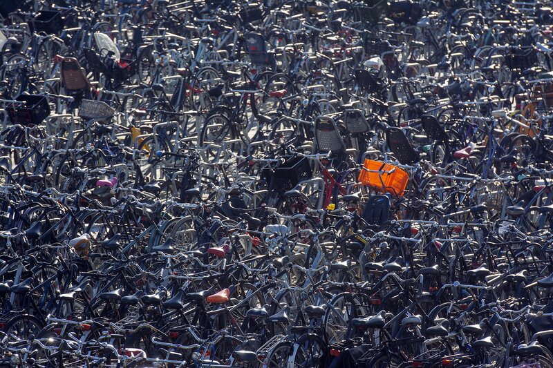 Bicycles in a Parking Lot