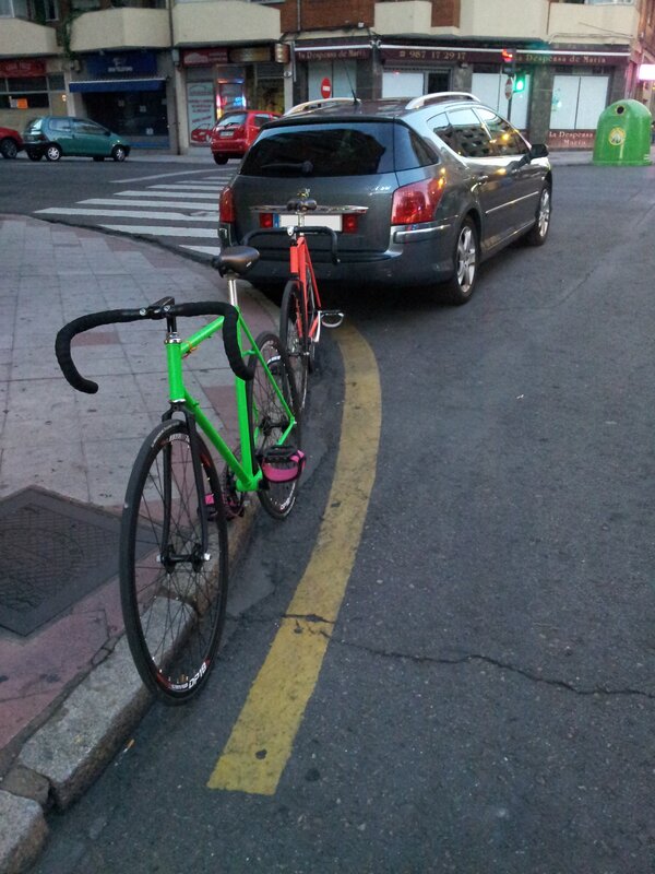Bicycles parked on a city street