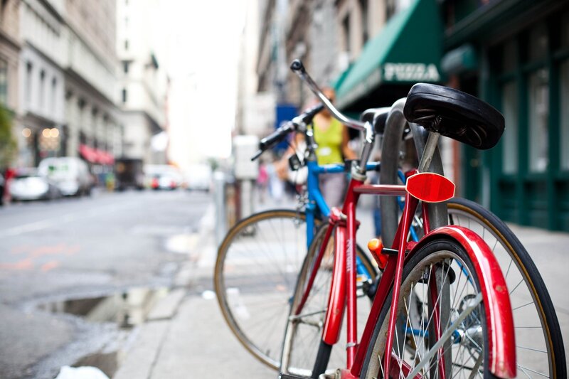 Bicycles parked on city sidewalk