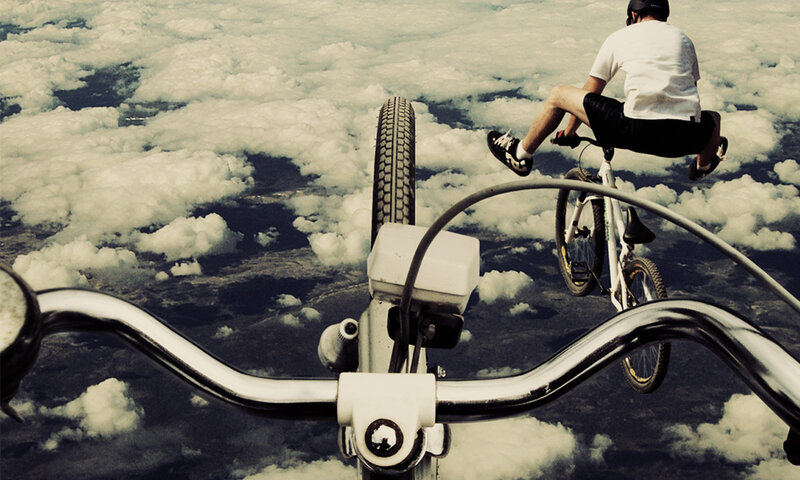 Bicyclists in the clouds