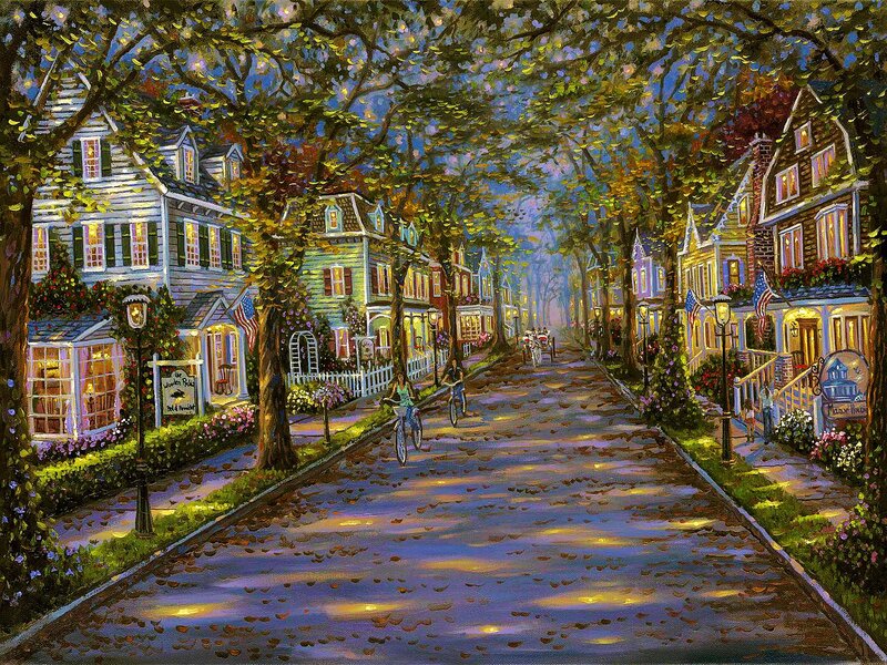 Bicyclists on Tree-lined Street