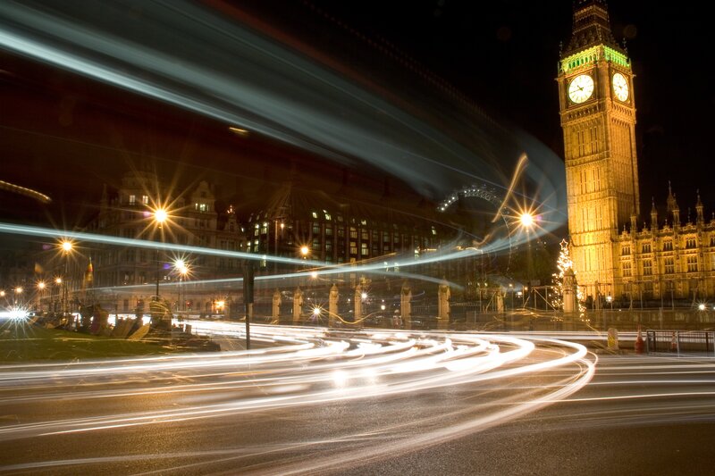 Big Ben at night with light trails