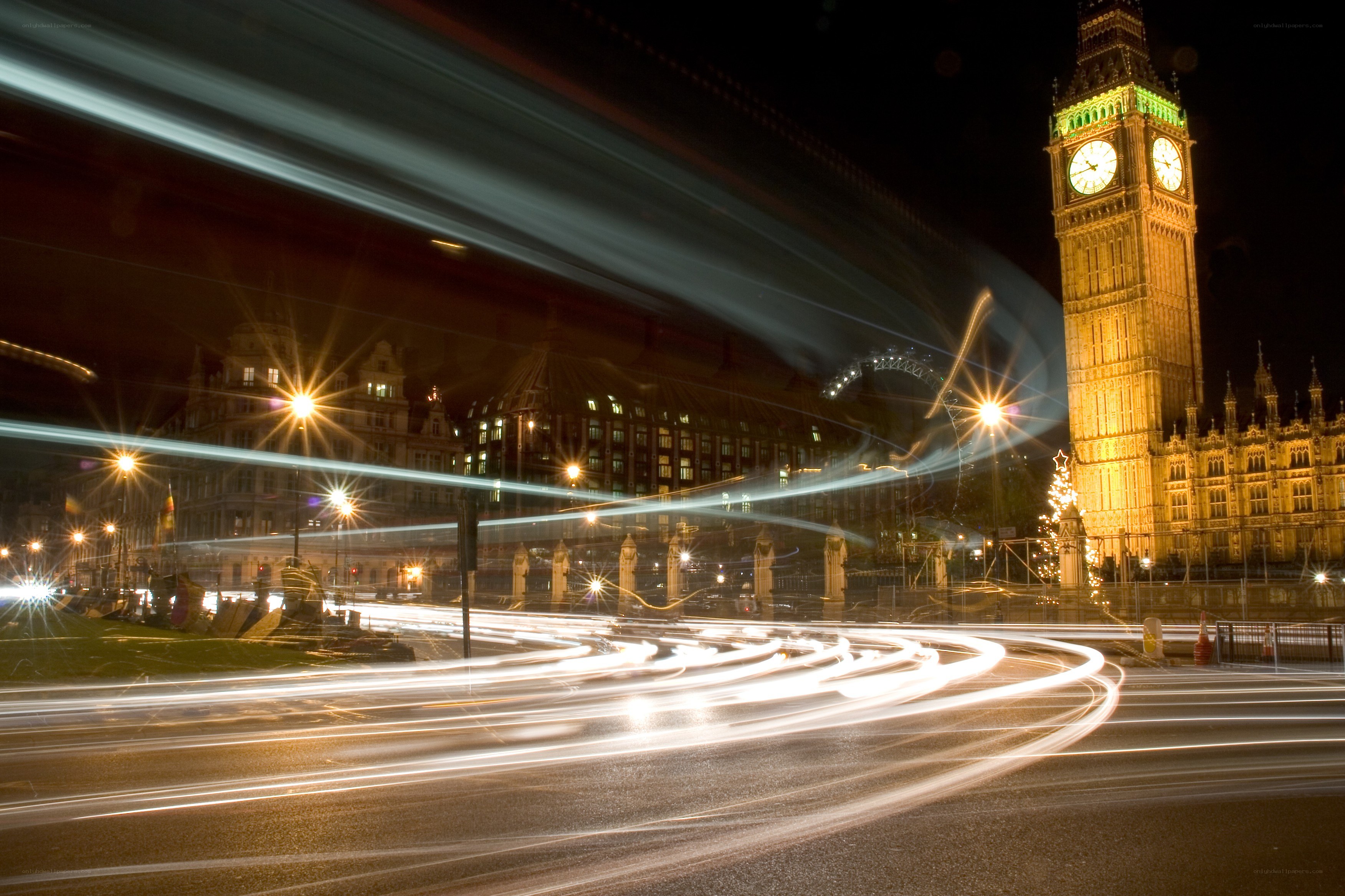 Big Ben at night with light trails