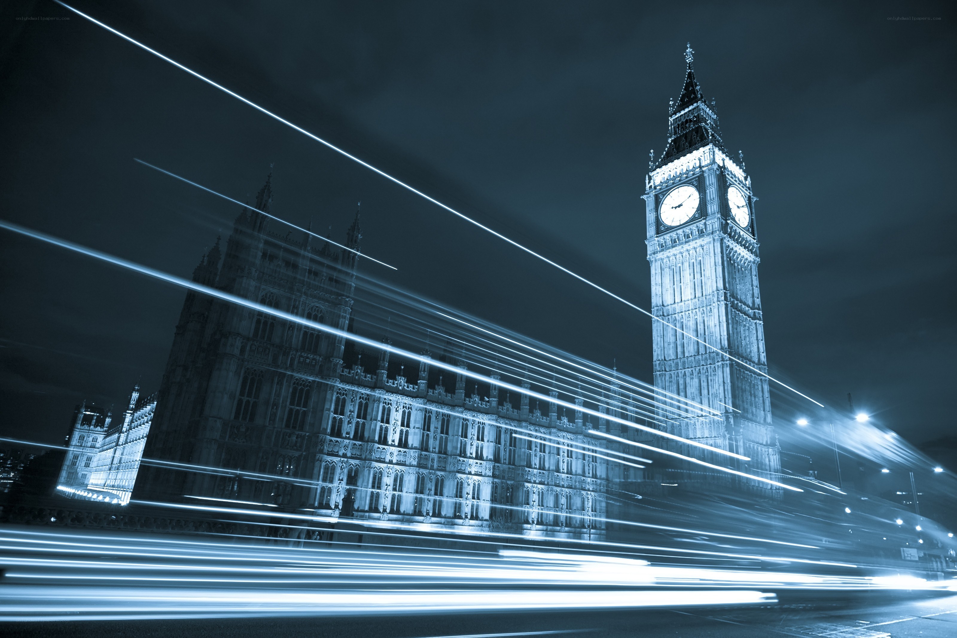 Big Ben at night with light trails