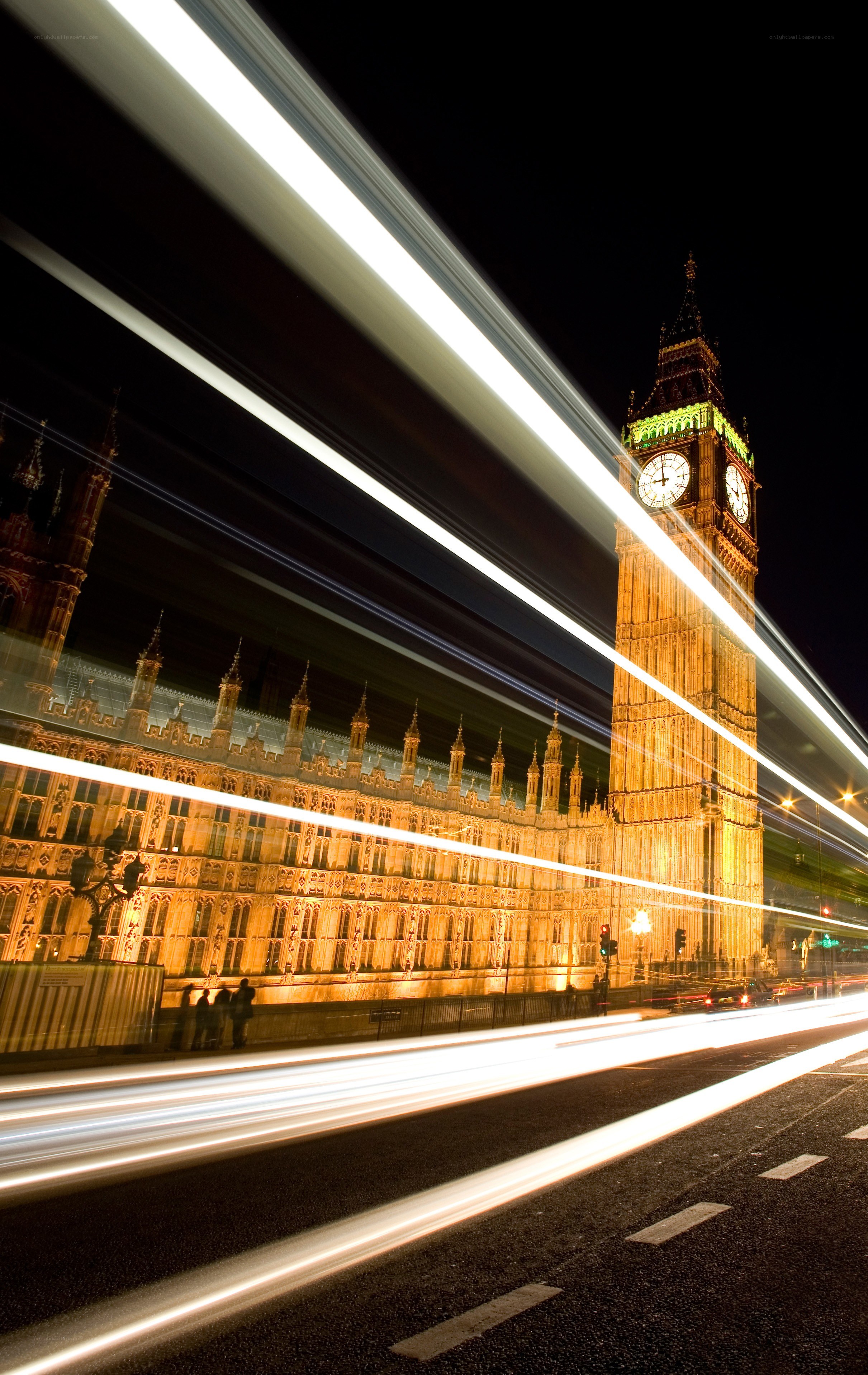 Big Ben at night with light trails