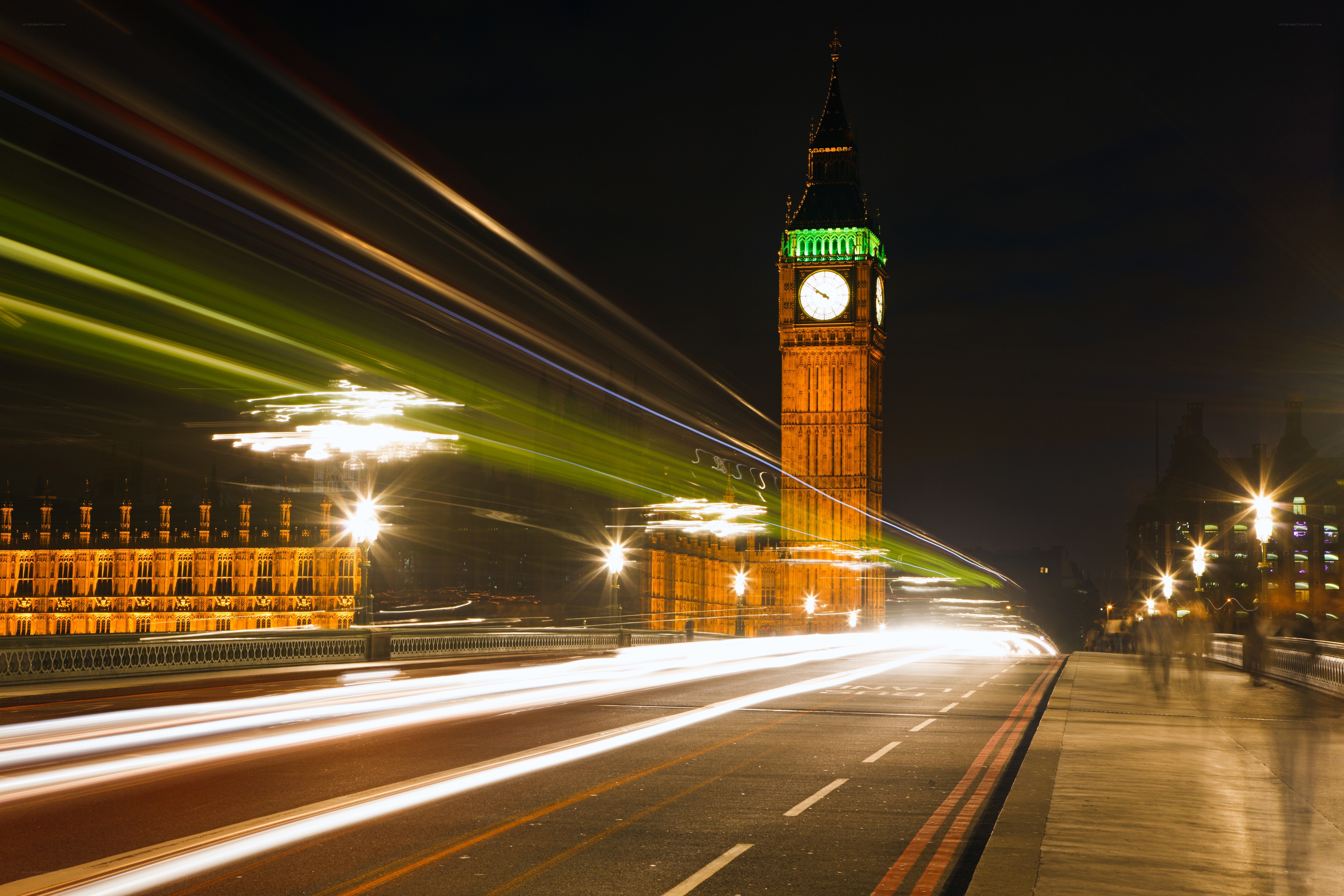 Big Ben at night with light trails