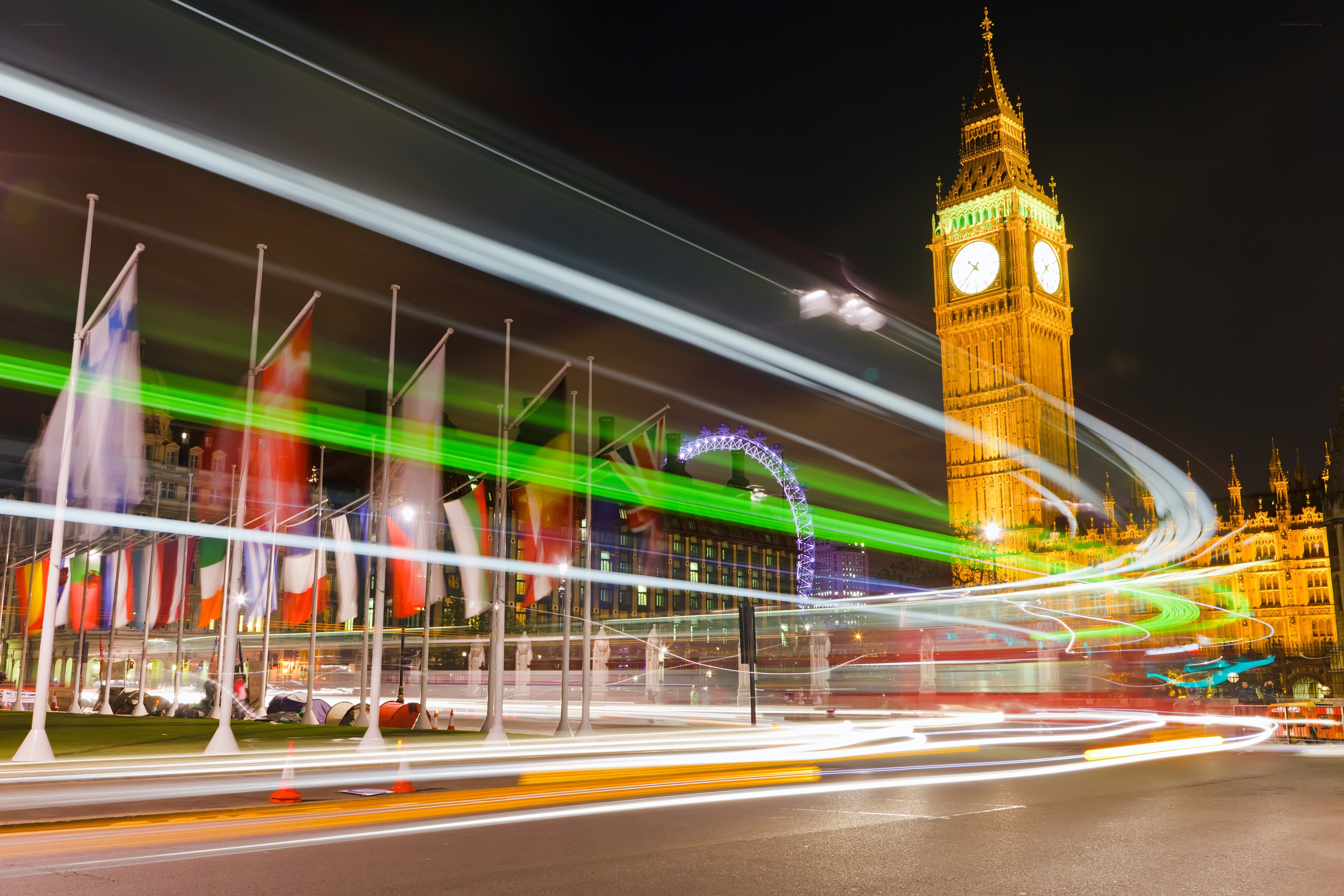 Big Ben at night with light trails