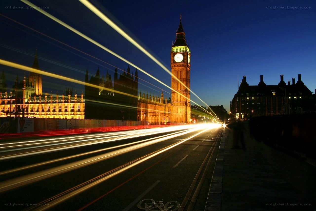 Big Ben at night with light trails