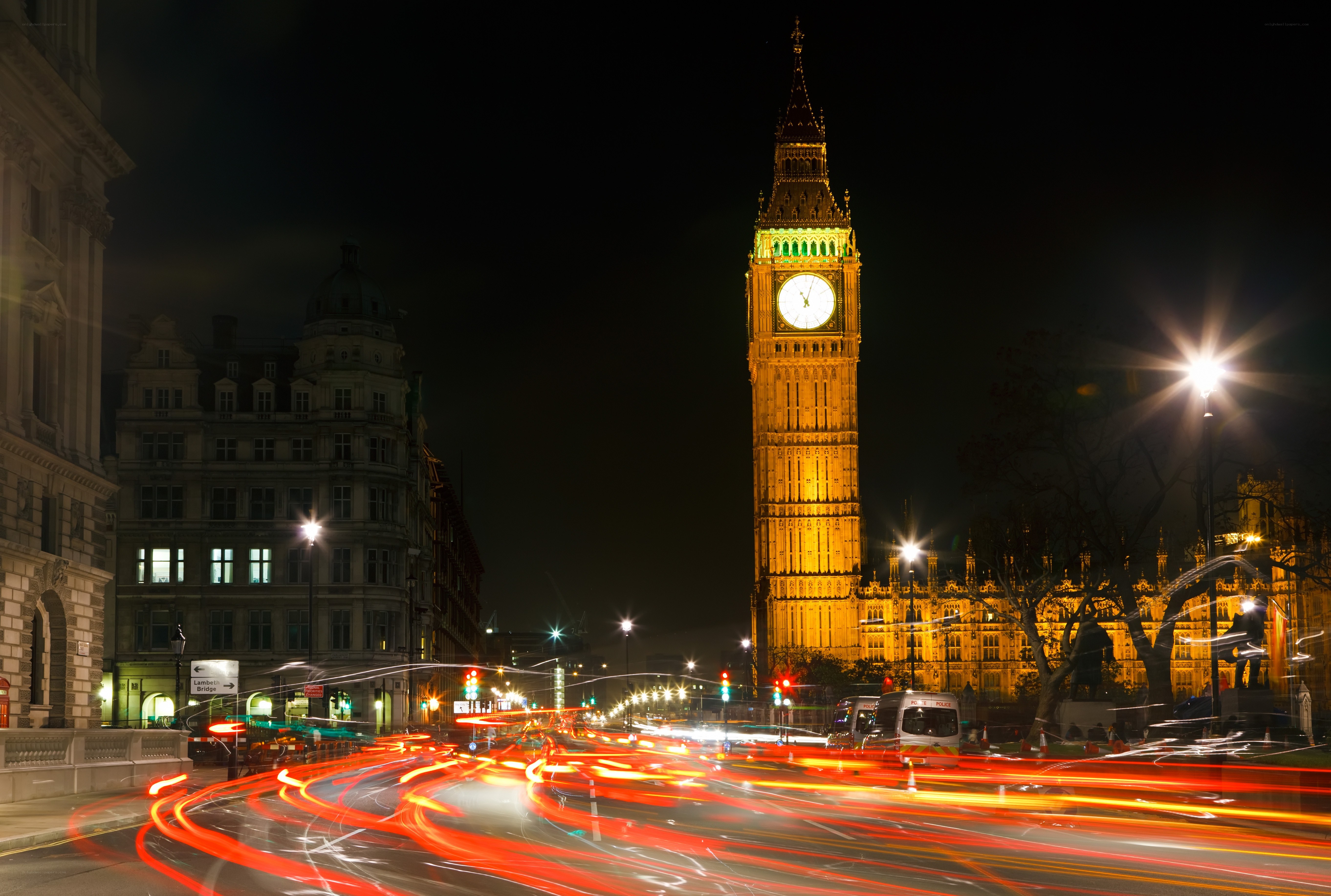 Big Ben at night with traffic