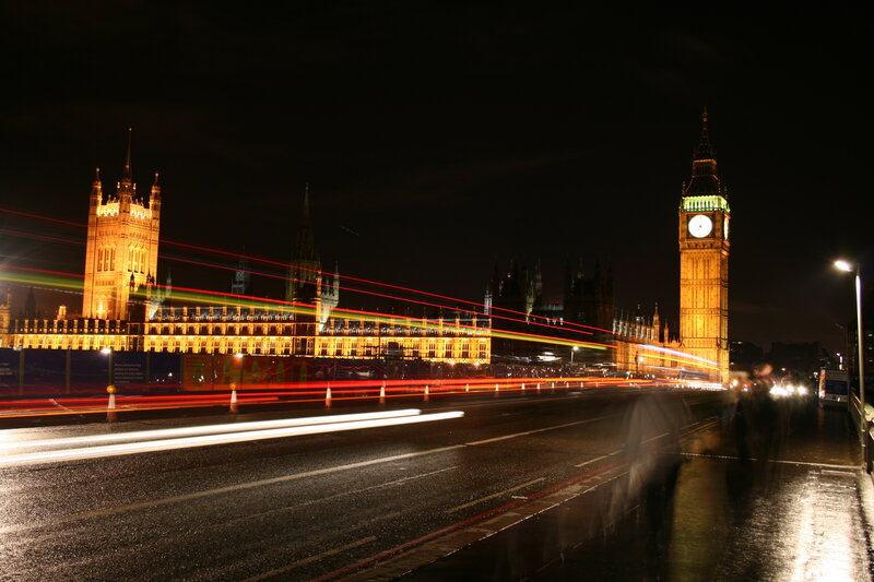 Big Ben at night with traffic