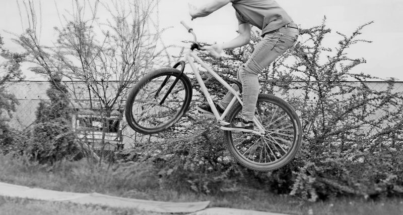 Bike rider mid-air jump