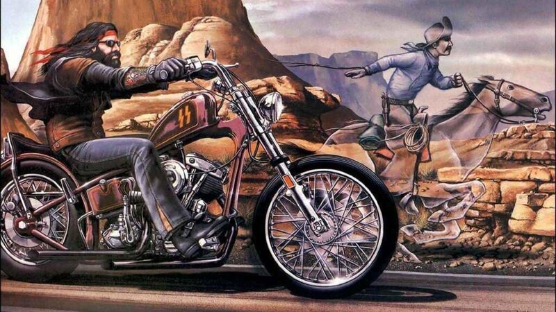 biker and cowboy in desert