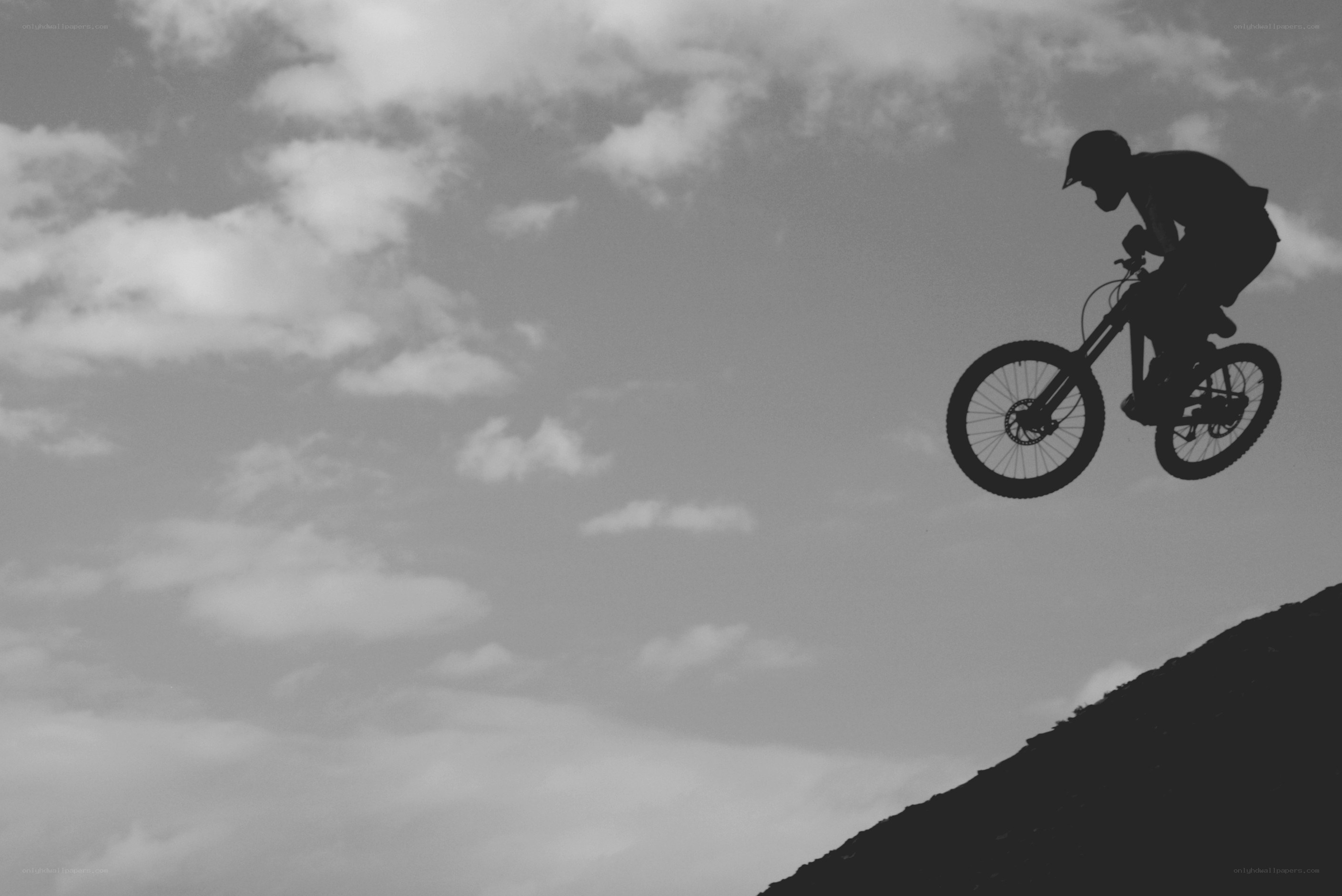 biker in mid-air jump