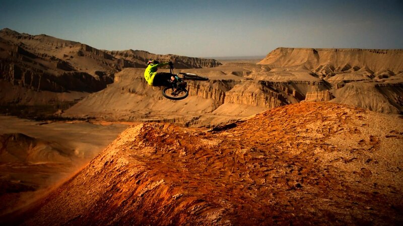 Biker in Mid-air Jump — Brown