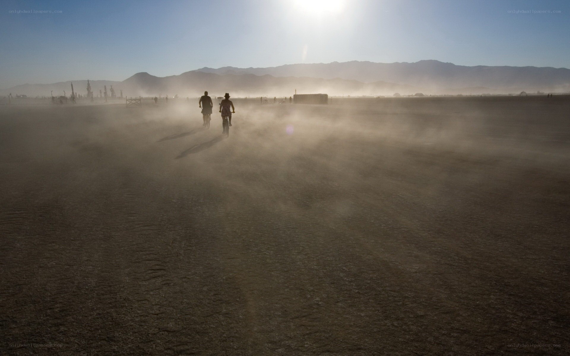 Bikers in a dusty desert