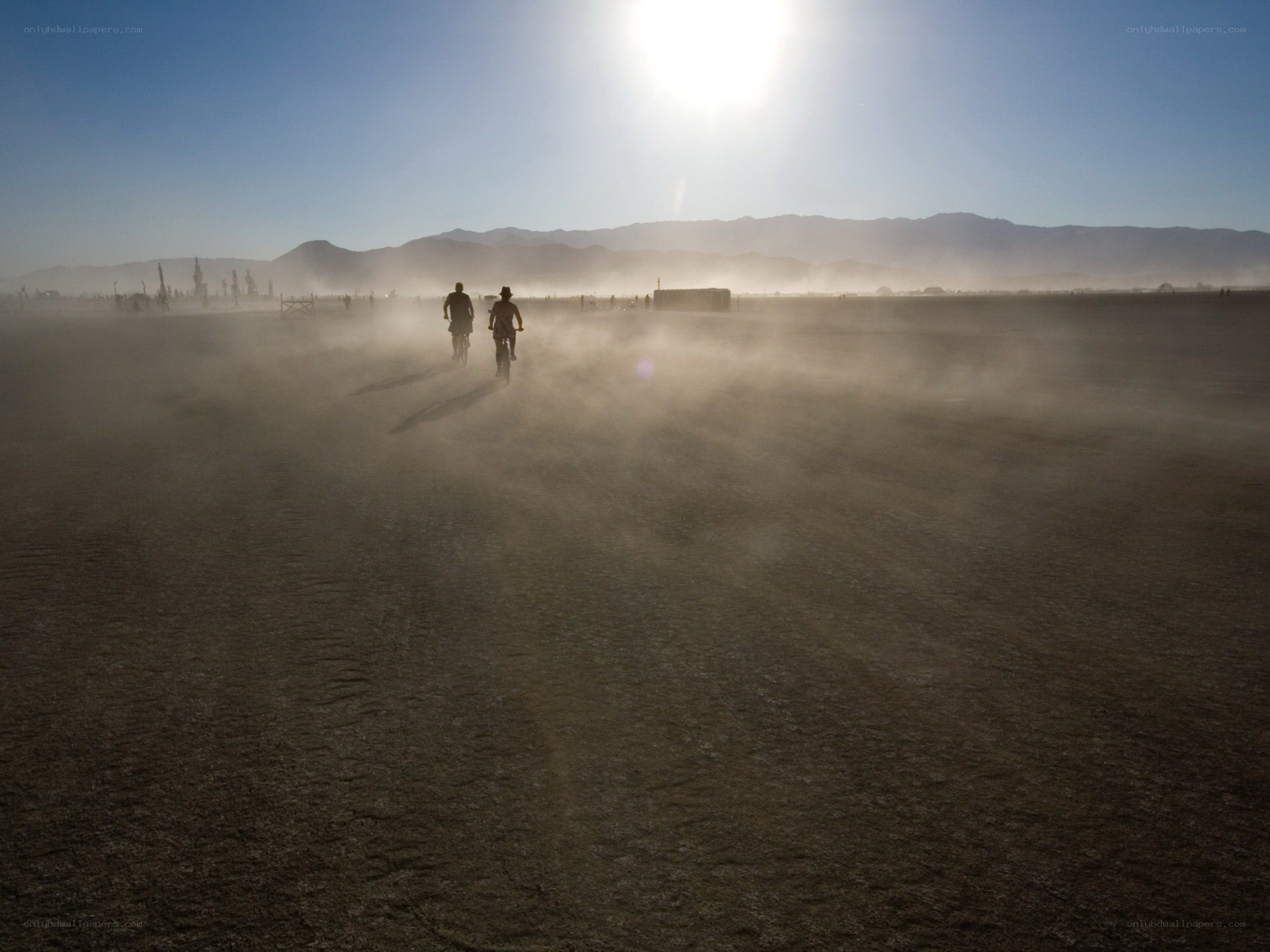 Bikers in a dusty desert