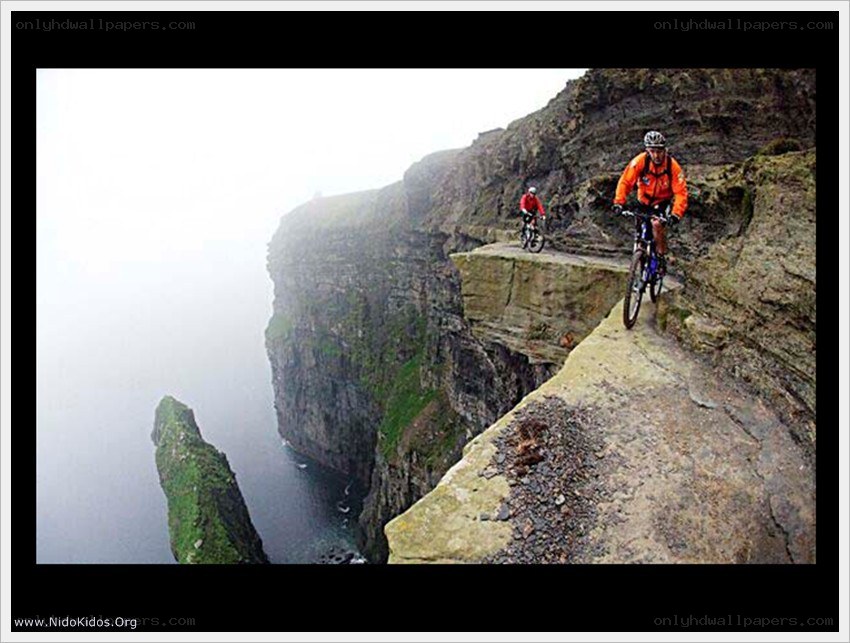 Biking on a cliff edge