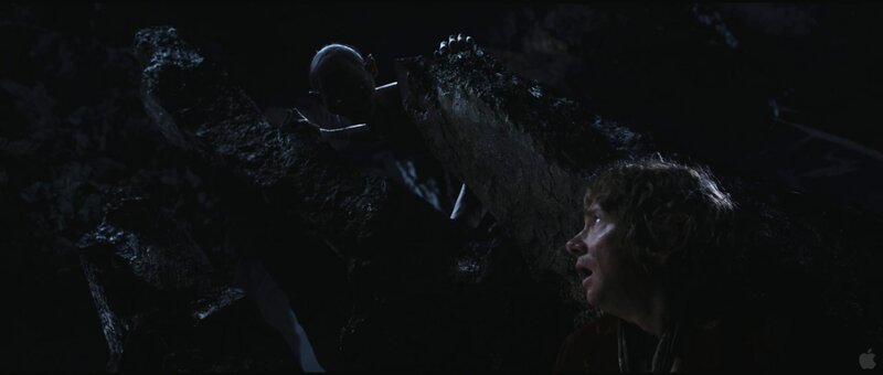 Bilbo and Gollum in a cave