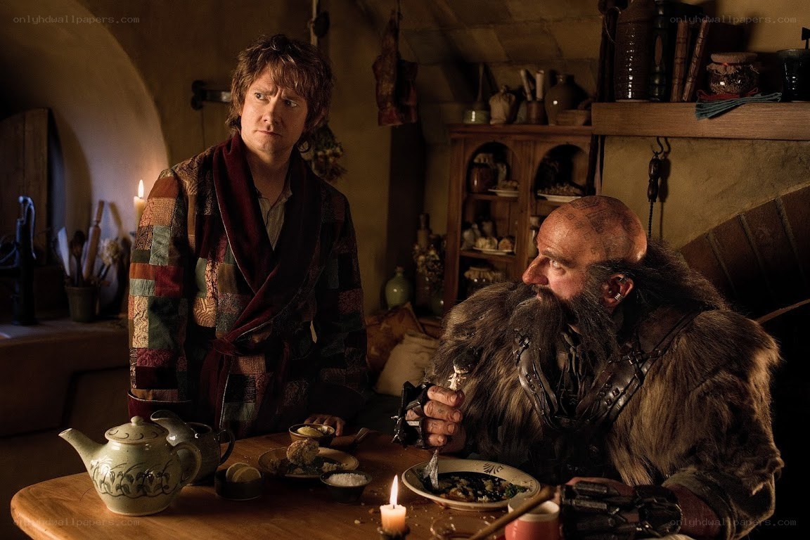 Bilbo and Thorin at a table