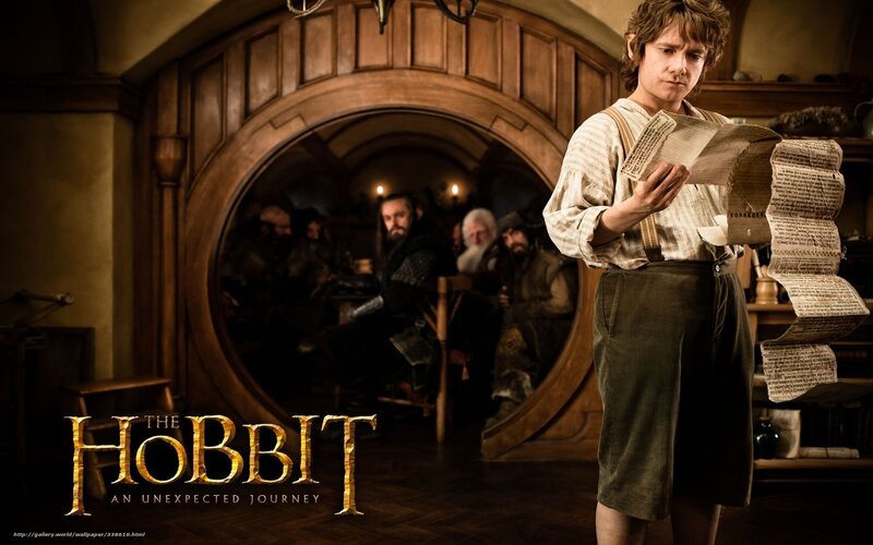 Bilbo Baggins reading a scroll