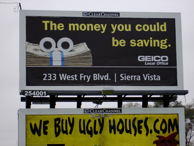 billboard ads for geico and ugly houses