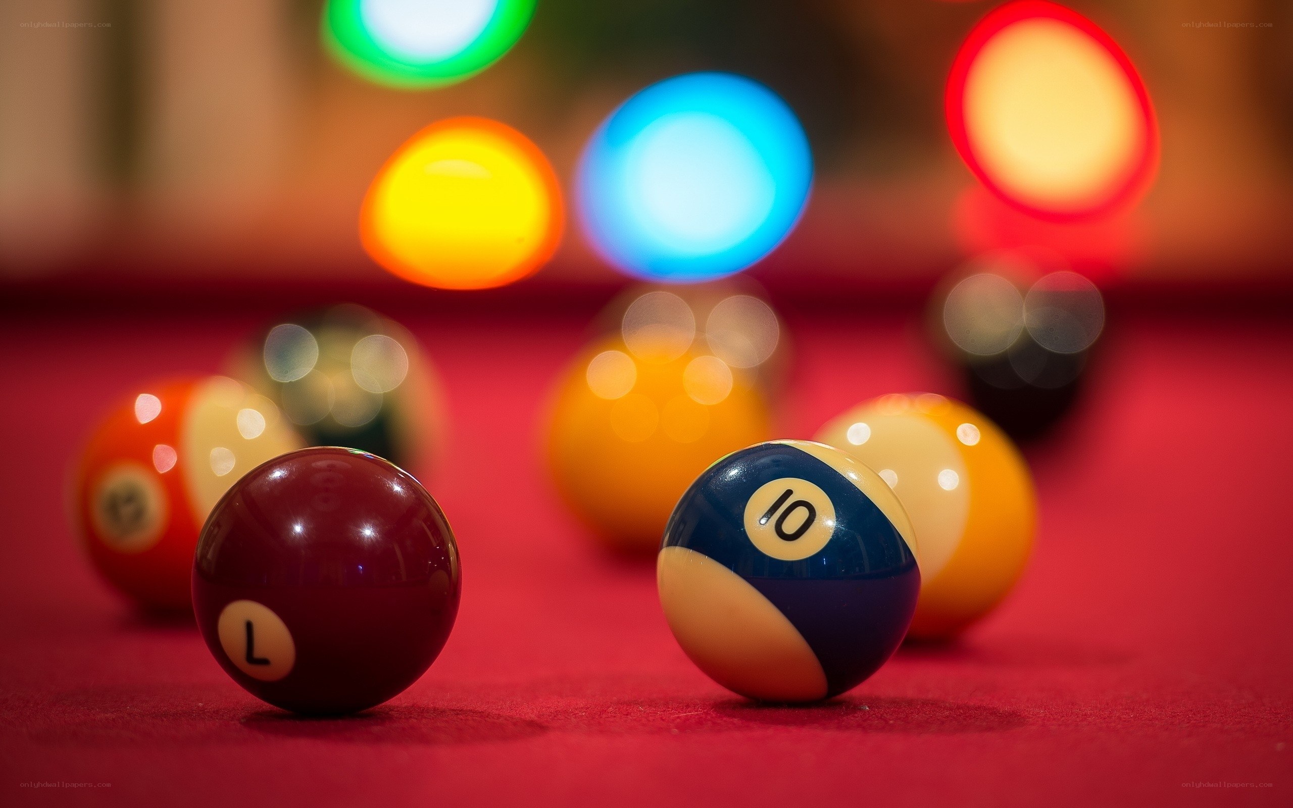 Billiard balls on a red table