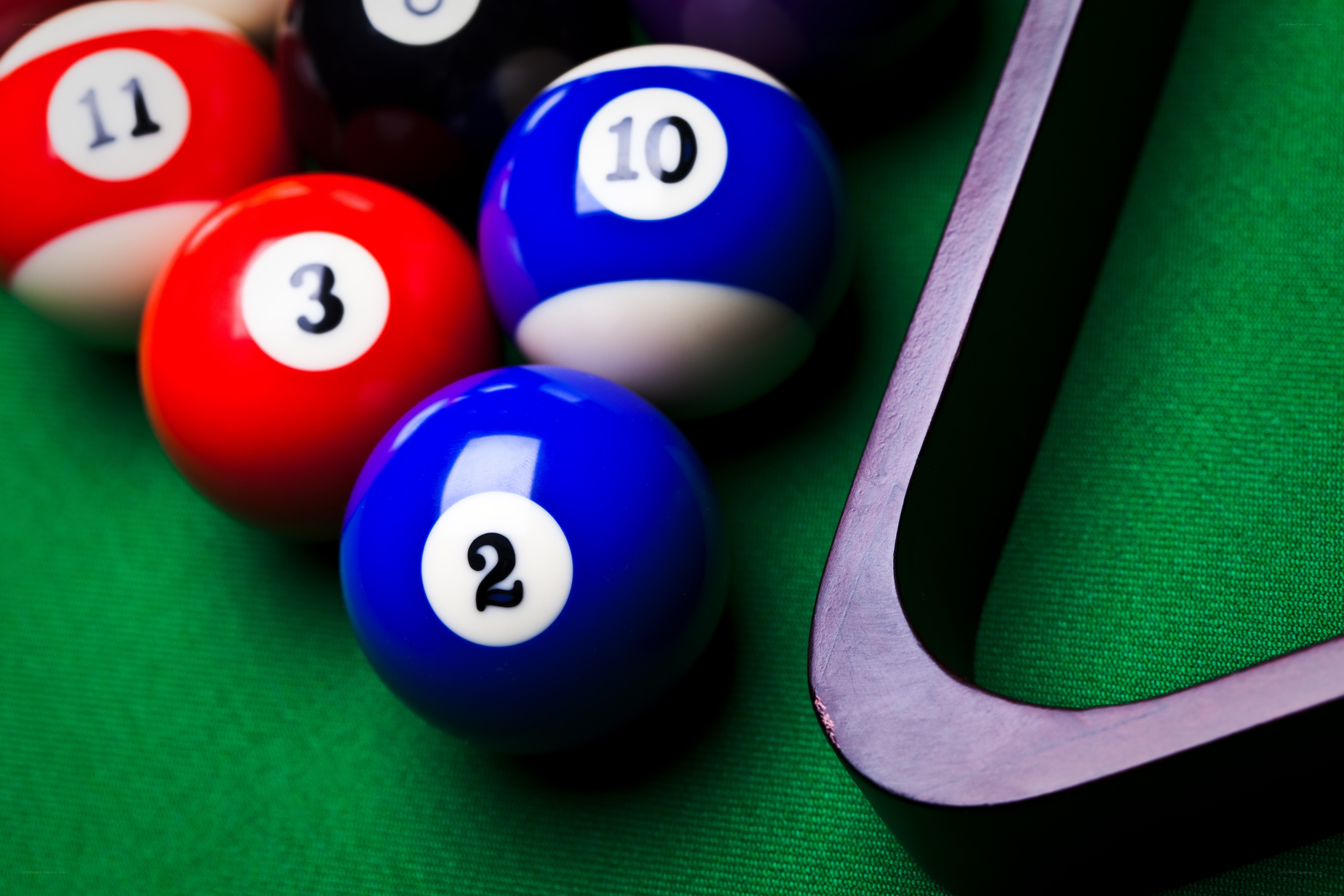 Billiard balls on green felt