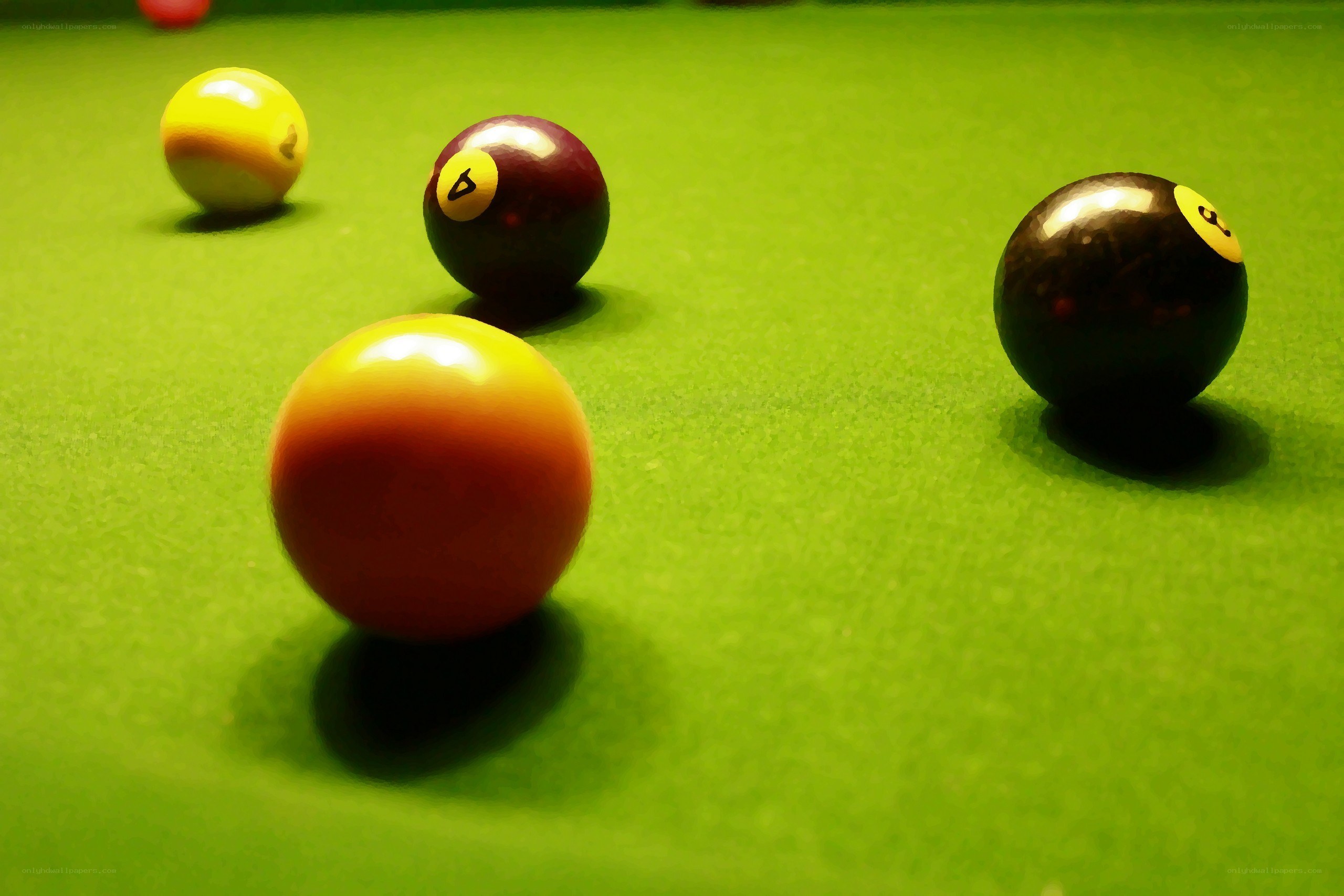 Billiard balls on green table