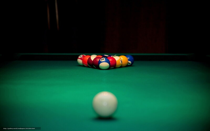 Billiards balls on green table
