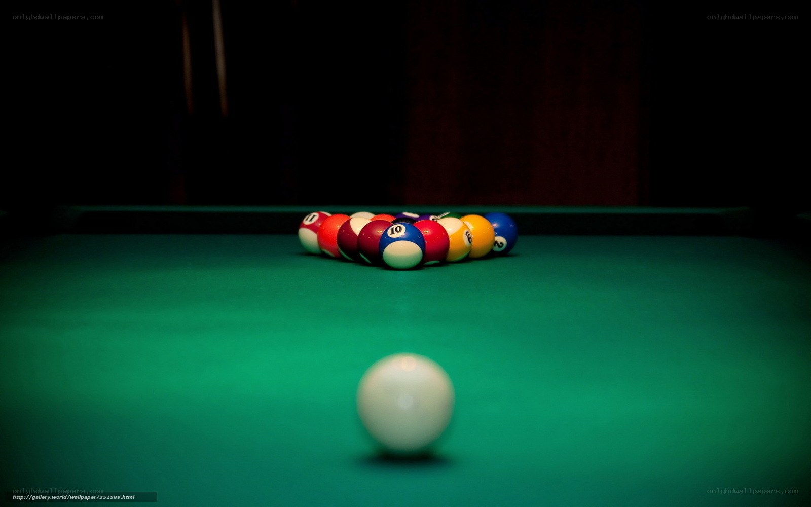 Billiards balls on green table