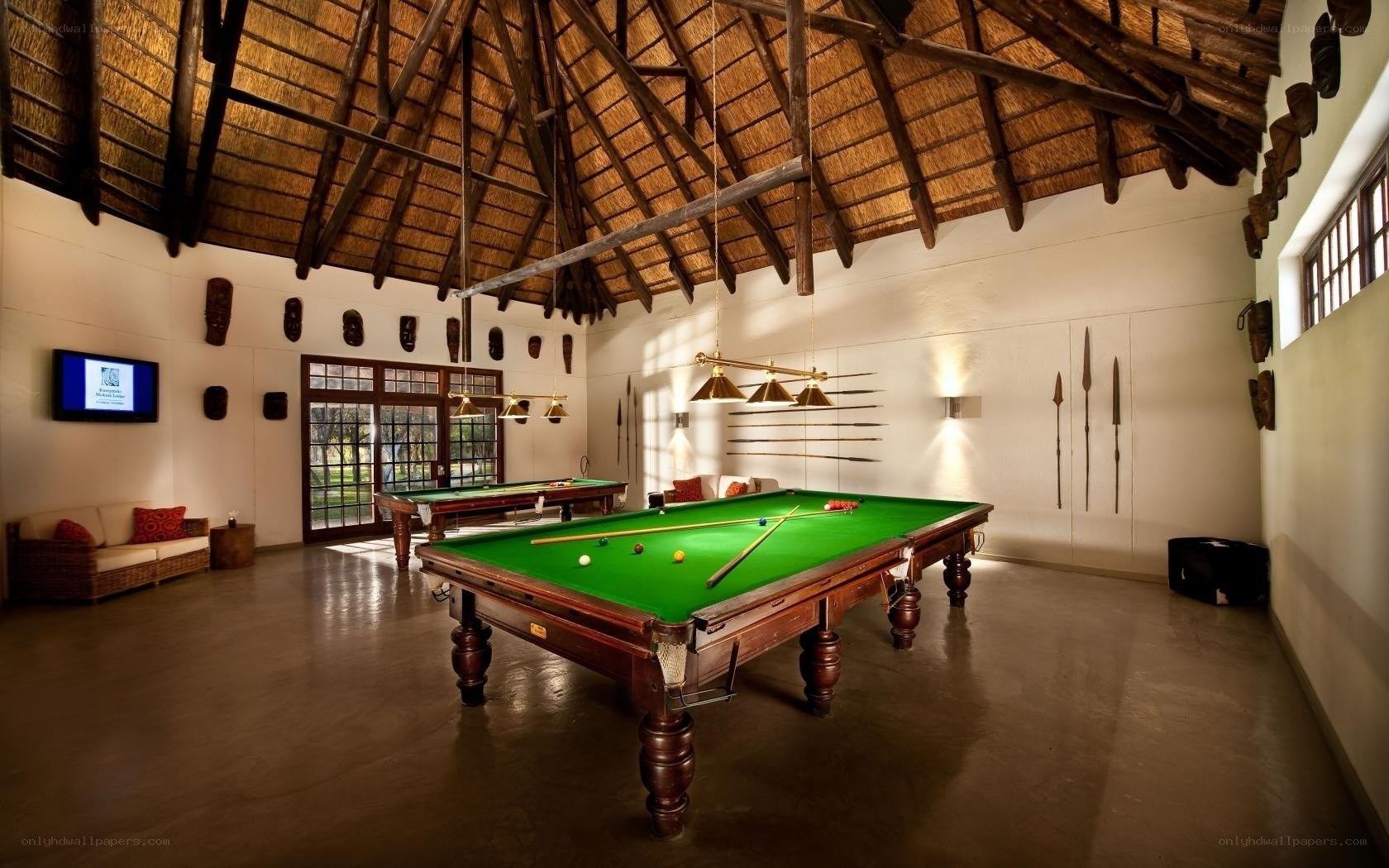 Billiards room with African decor