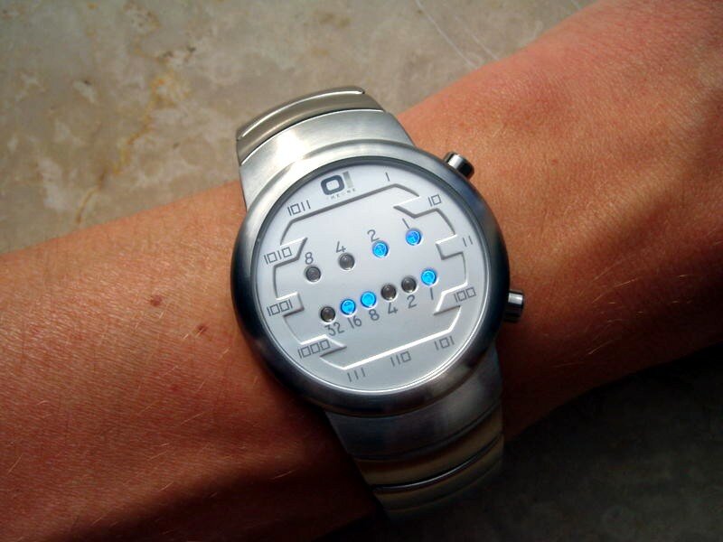 binary watch on wrist