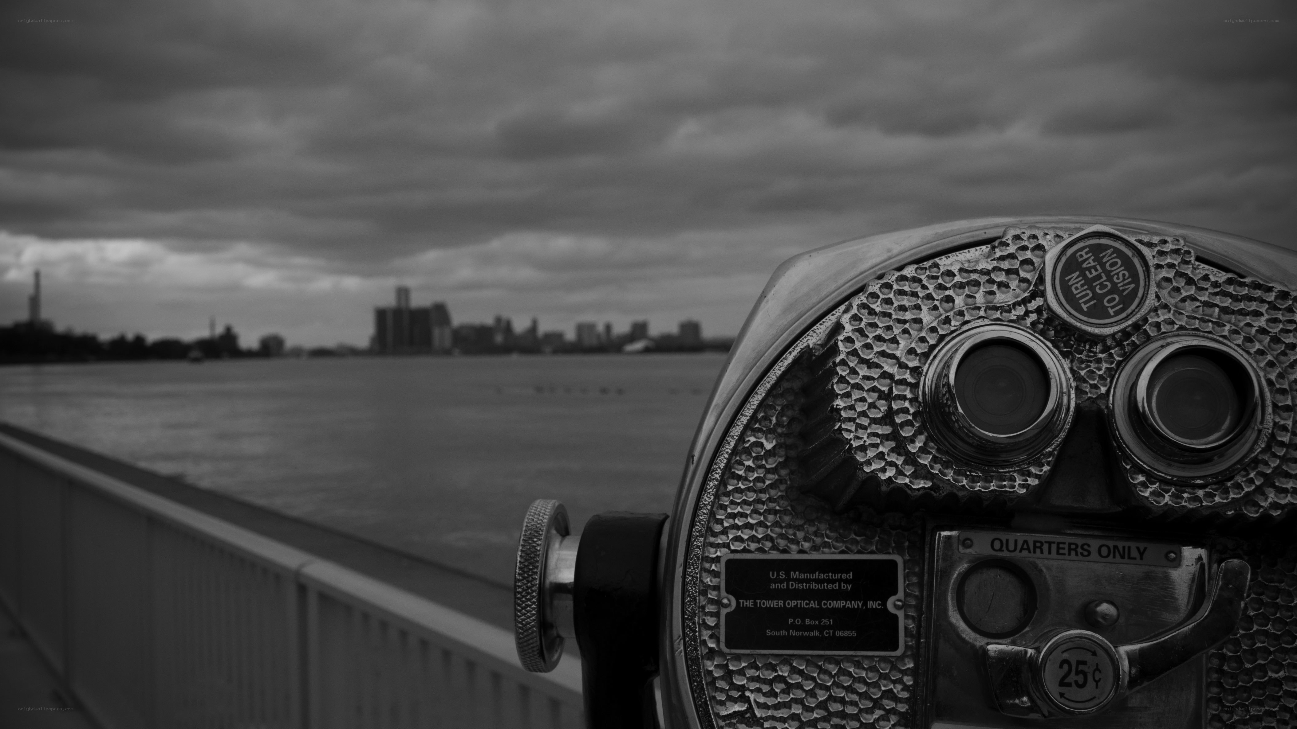 Binoculars overlooking a city