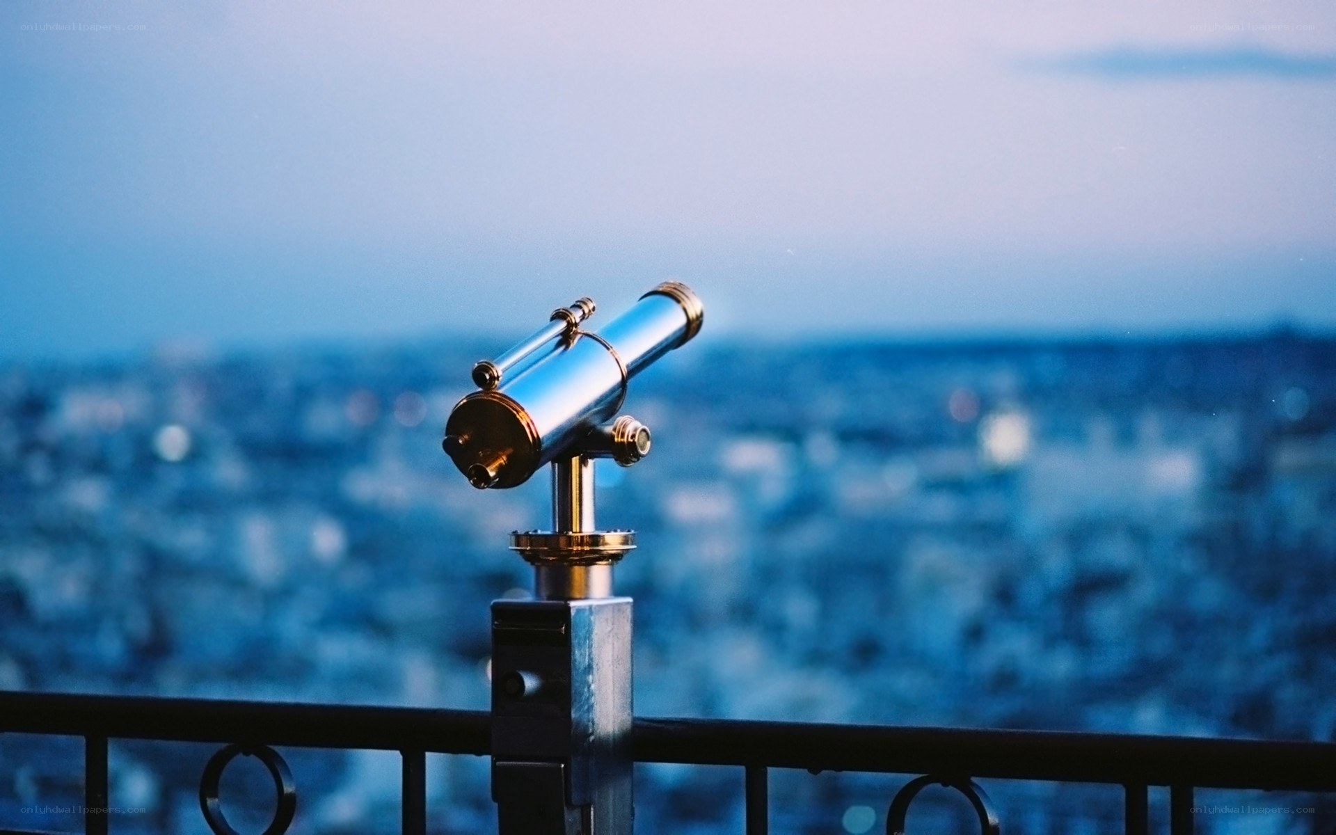 Binoculars overlooking a city